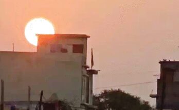 A bright sun shining over a thermometer, depicting the sharp rise in temperature in Raipur and Bilaspur, Chhattisgarh.