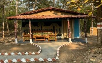 A beautiful traditional mud house surrounded by the lush green forests of Devpur Nature Camp near Barnawapara, Chhattisgarh.