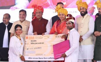 A historic moment showing the official certificate of the Golden Book of World Records being presented for the grand mass marriage event in Chhattisgarh.