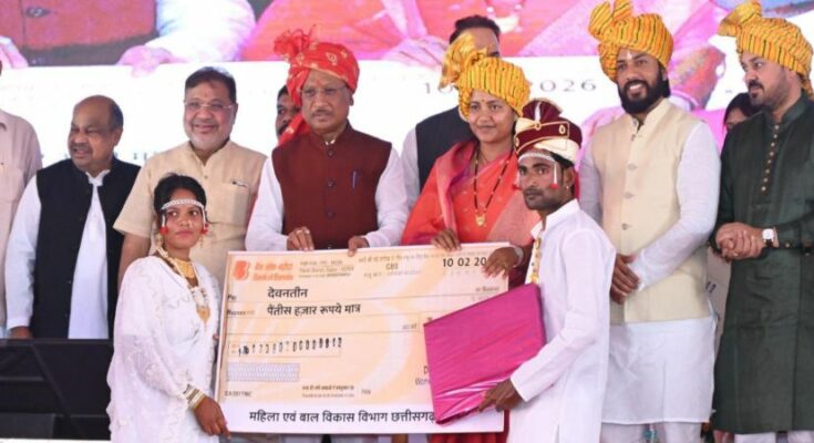A historic moment showing the official certificate of the Golden Book of World Records being presented for the grand mass marriage event in Chhattisgarh.