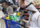 Empty supermarket shelves and halted cargo ships depicting the looming Dubai food crisis amid the global trade disruption caused by the Iran-US war.