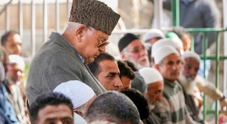 National Conference chief Farooq Abdullah offering Alvida Jumma prayers amidst a large crowd of devotees at the historic Hazratbal Dargah in Srinagar, Kashmir.
