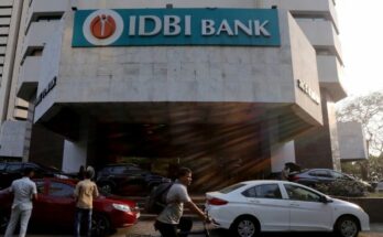 A conceptual business image showing the IDBI Bank logo and a downward financial arrow, representing the lower bids and stalled privatization process.