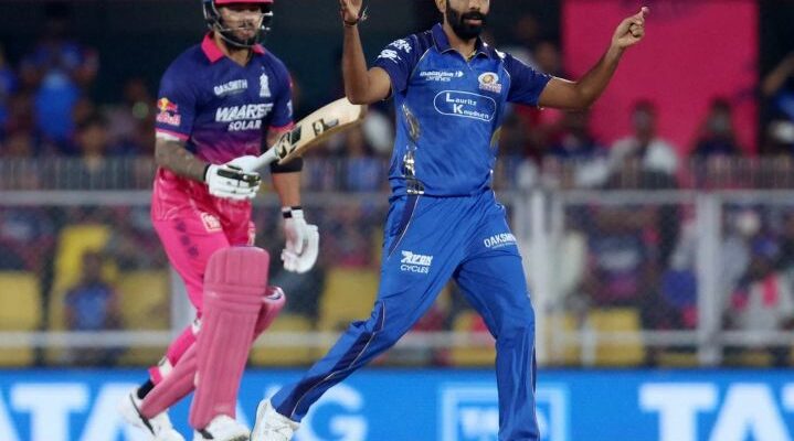 A conceptual image highlighting the Jasprit Bumrah Stats, showing a disappointed Jasprit Bumrah looking down on the pitch, with a scoreboard indicating zero wickets in three.