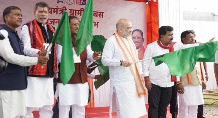 A conceptual image showing a passenger bus driving through the lush green Kaknar Valley in Bastar, symbolizing development and the end of Naxal terror in Chhattisgarh.
