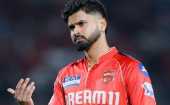 कोलकाता नाइट राइडर्स की जर्सी पहने हुए कप्तान श्रेयस अय्यर का एक आक्रामक और मुस्कुराता हुआ चित्र